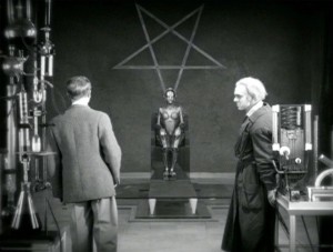 The robot made to control the masses through lust, birthed under an inverted pentagram Source